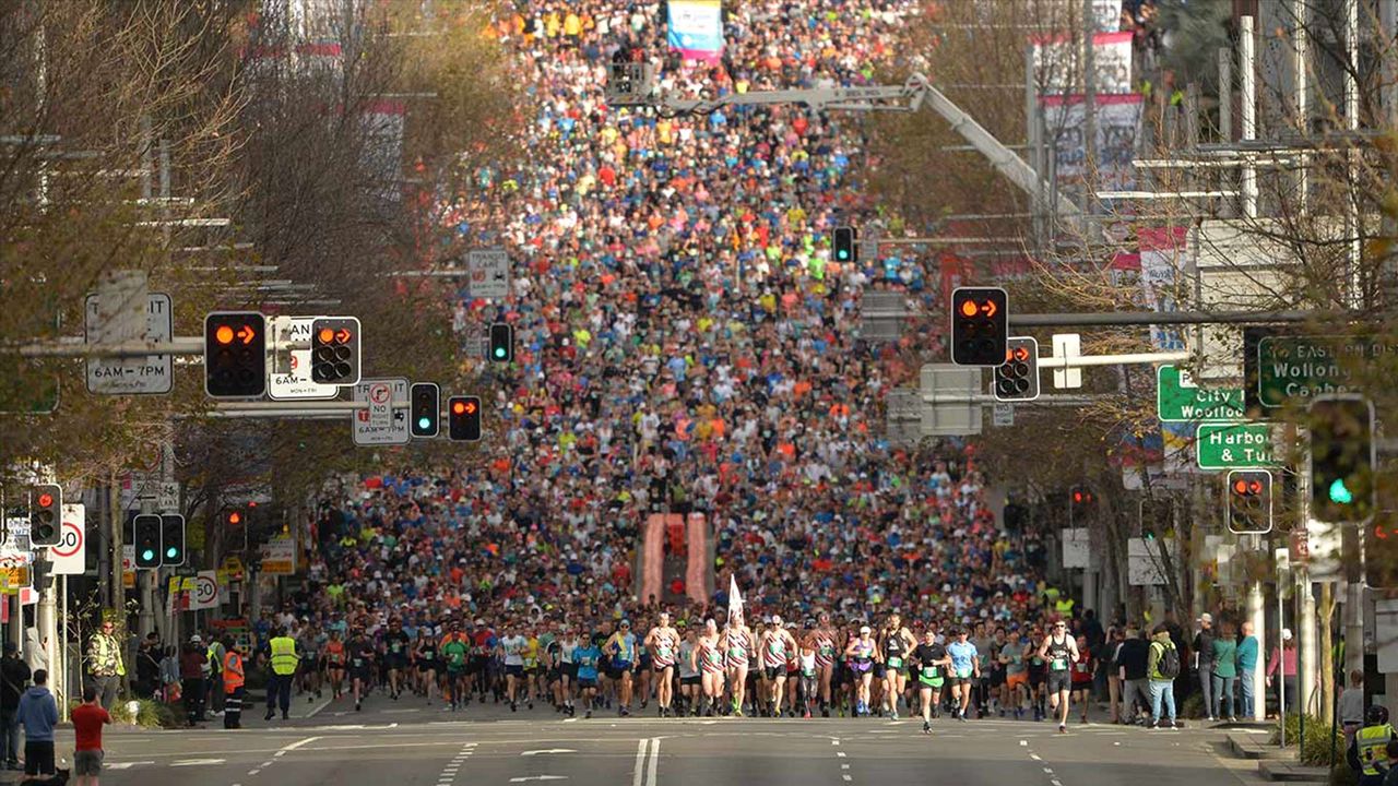 Thousands of runners take part in the annual City2Surf road race on August 12, 2018