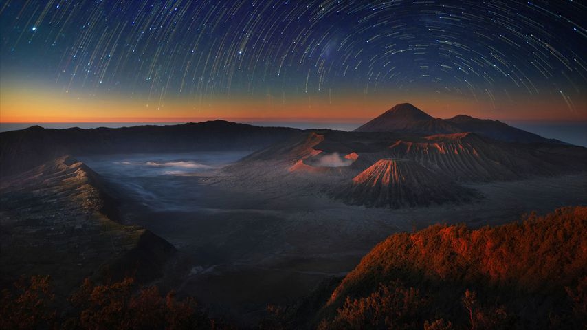 Time-lapse exposure of the night sky above Bromo Tengger Semeru National Park in East Java, Indonesia