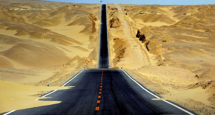 Highway through Qaidam Basin in western China