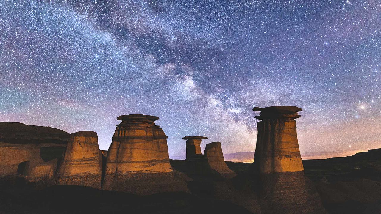 Milky-way over hoodoo rock formations in the Canadian badlands, Drumheller, Alta.
