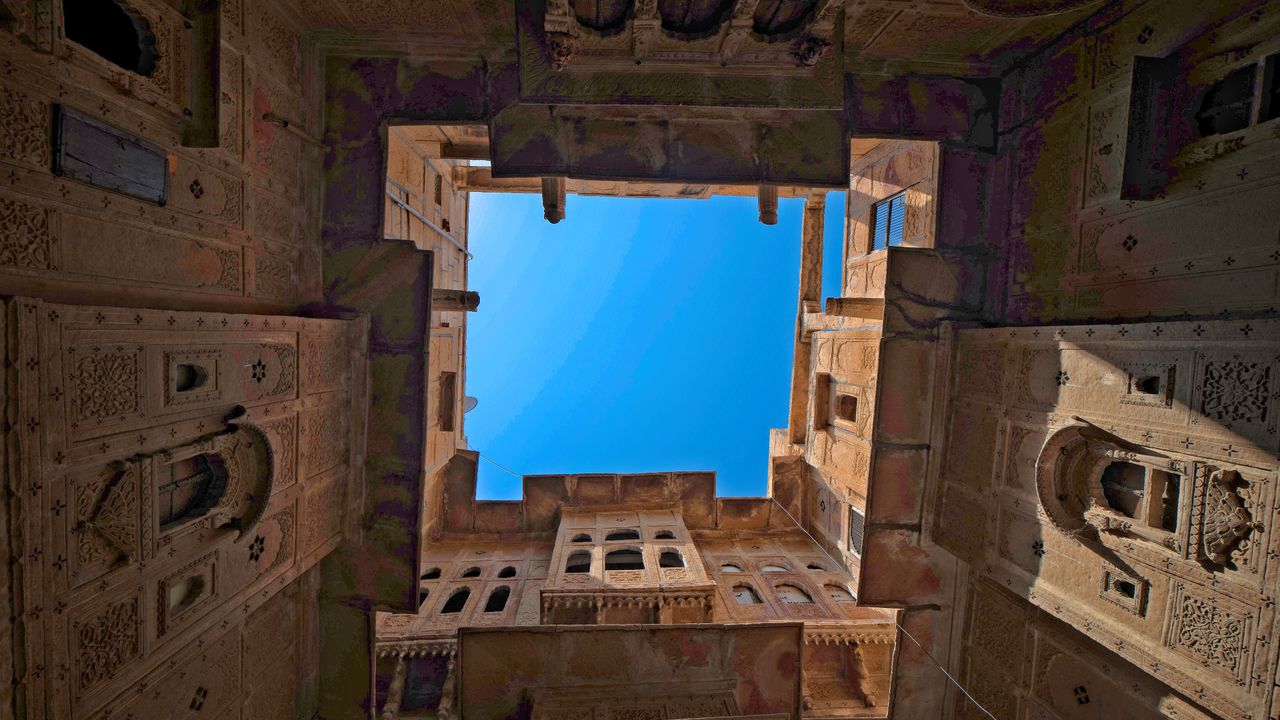 View into the sky from Nathmal Ki Haveli courtyard, Jaisalmer, Rajasthan