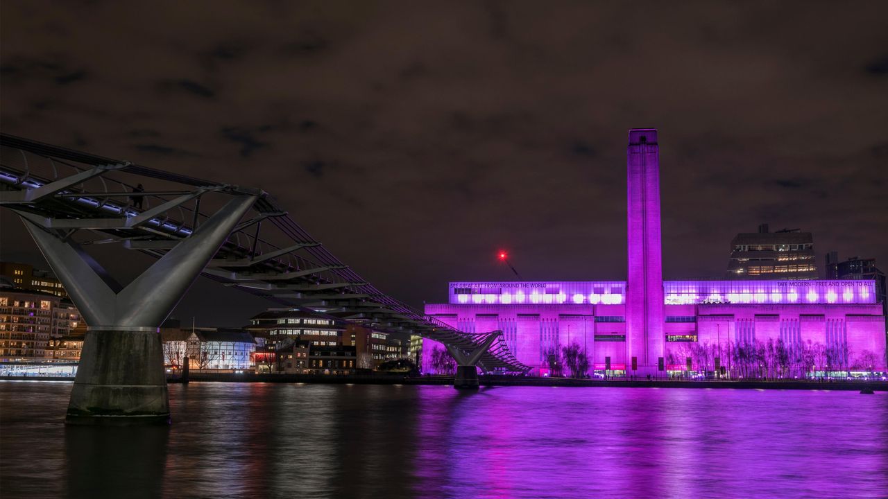 Tate Modern lit up on International Women's Day, London