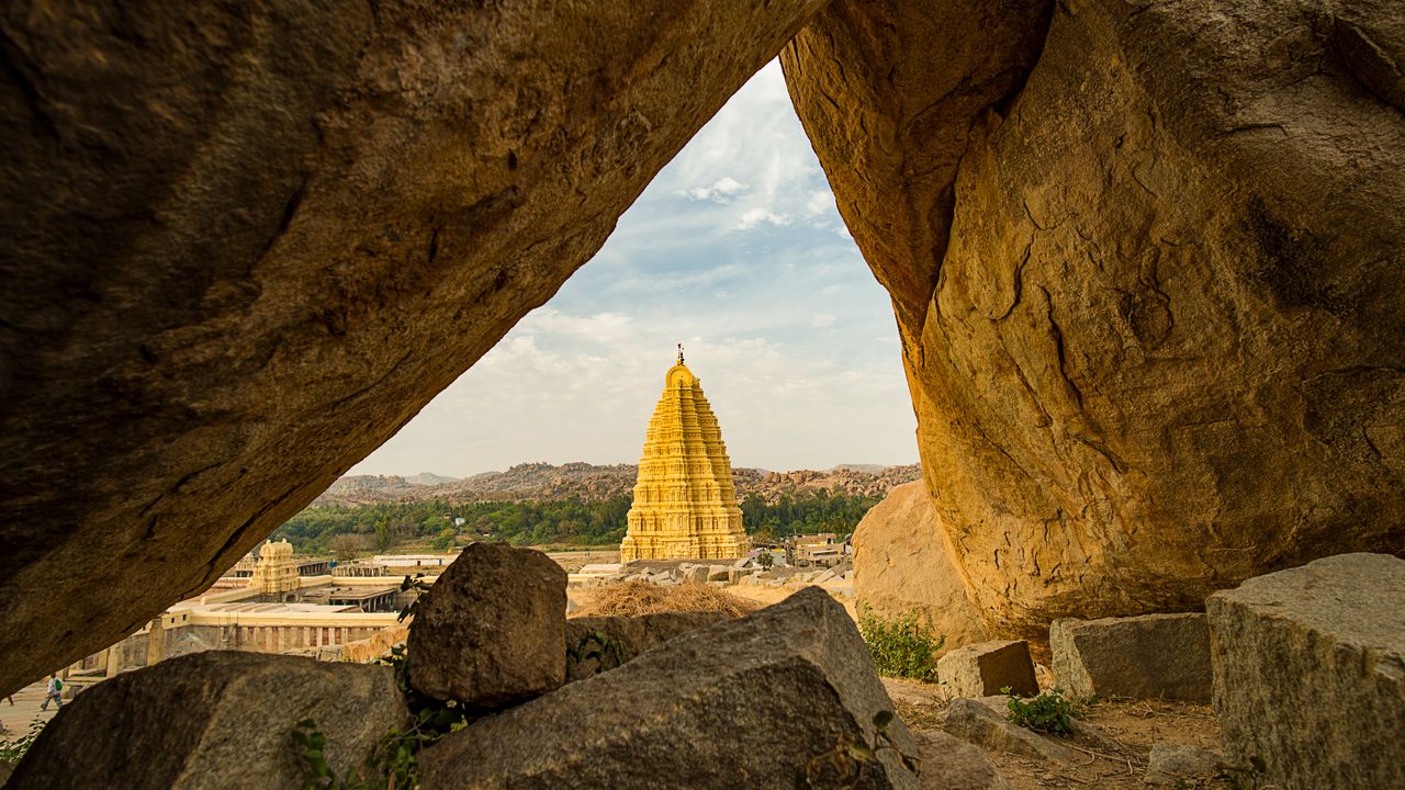 Virupaksha Temple framed by two huge rocks in Hampi, Karnataka