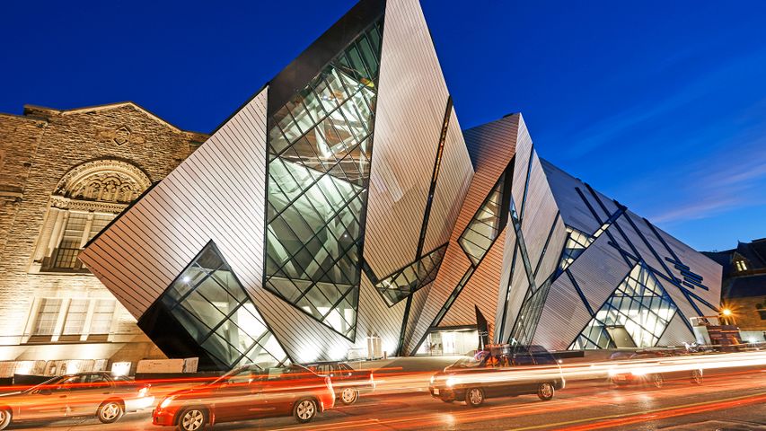 Façade of the 'Crystal' extension of the Royal Ontario Museum illuminated at night, Toronto