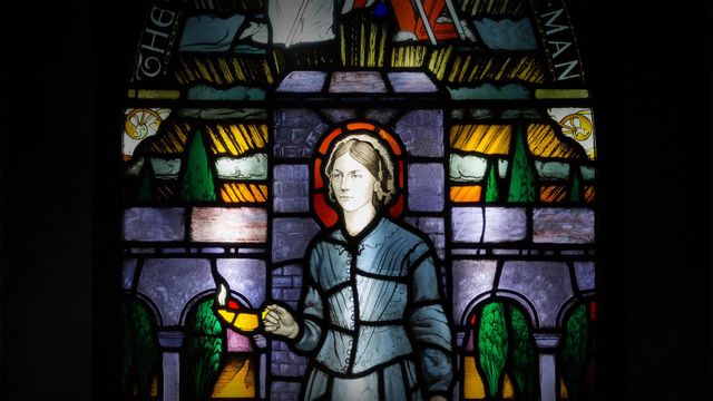 Painted and leaded glass window panel on display at the Florence Nightingale Museum, London, England