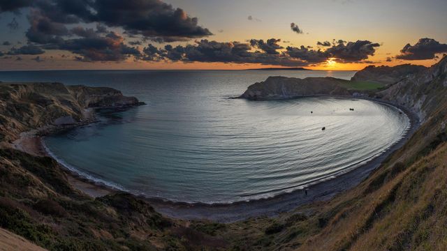 Panoramic view of Lulworth Cove at sunset, Dorset