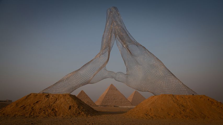 'Together' sculpture by Lorenzo Quinn, Great Pyramids of Giza, Cairo, Egypt