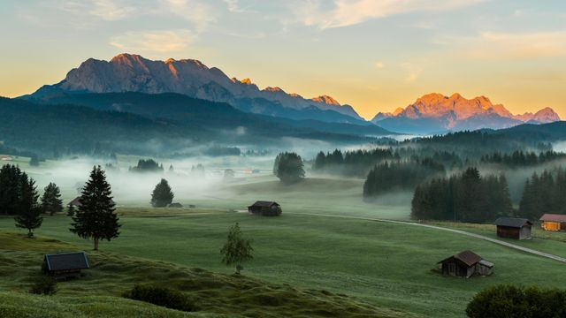Morning mist over Krün valley, Bavarian Alps, Germany