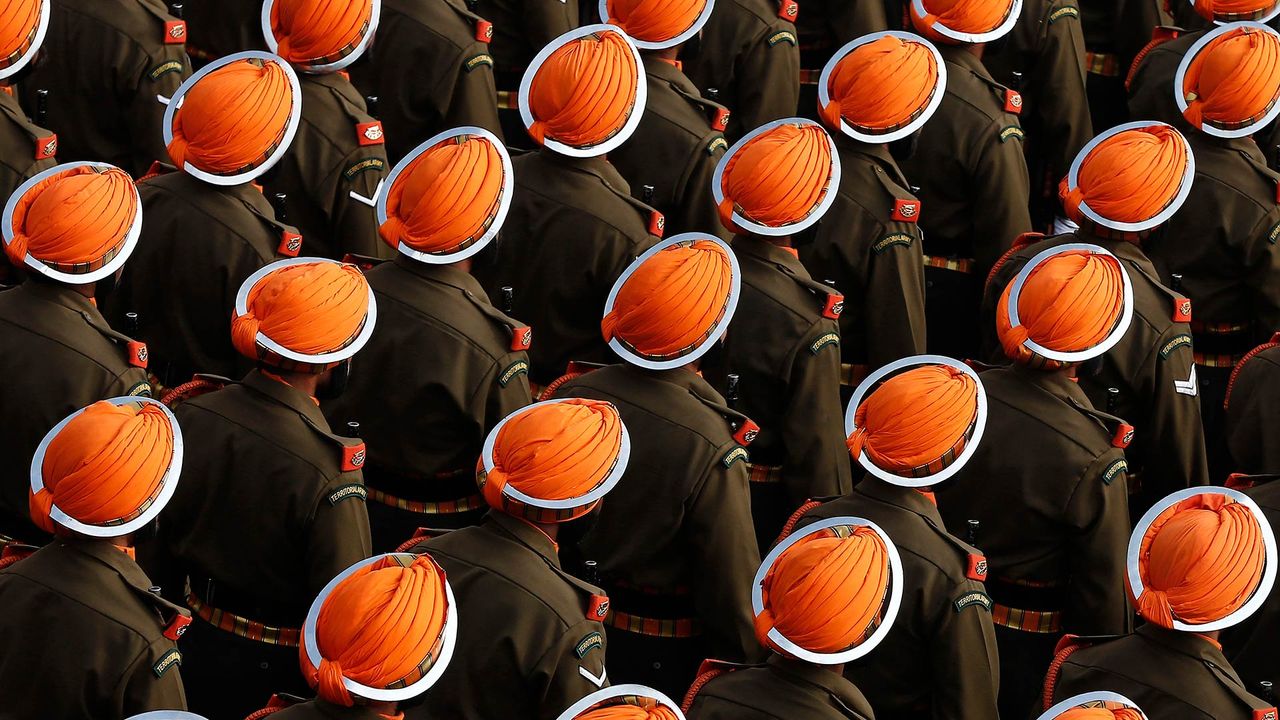 Indian army soldiers march during a dress rehearsal for the Republic Day parade