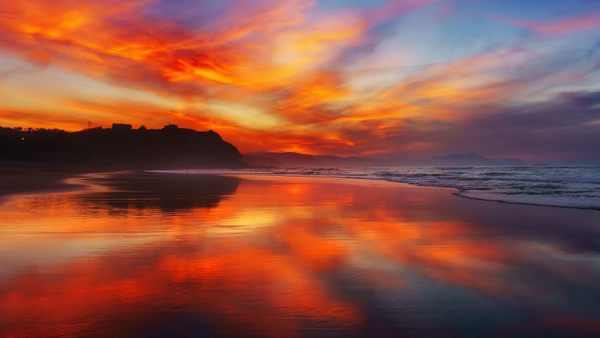 Sunset-scorched shores