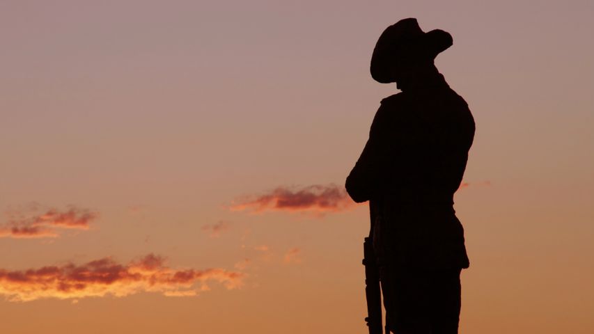An ANZAC Soldier statue in the evening light