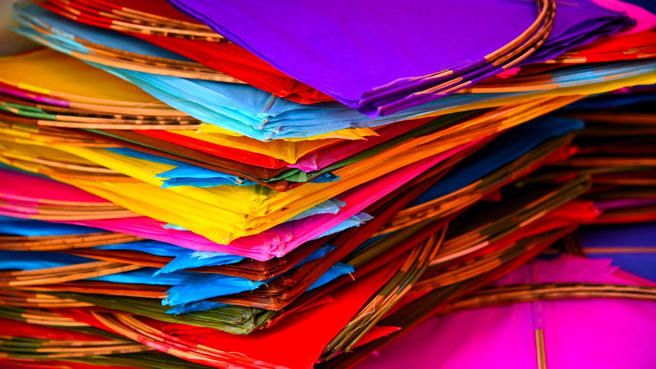 A bundle of colourful paper kites in India
