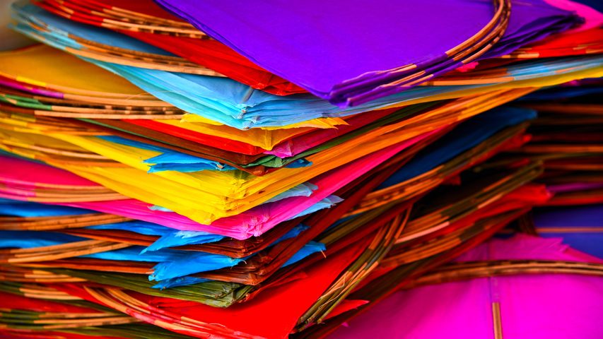 A bundle of colourful paper kites in India