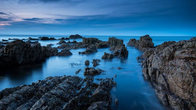 View of the coastline at dusk, Saint Andrews, Fife