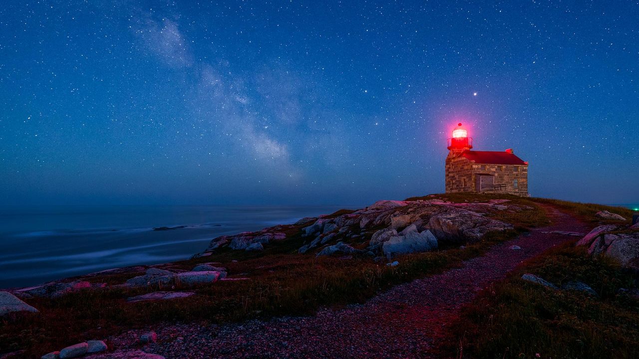 An old lighthouse under the starry sky in Rose Blanche, Nfld.