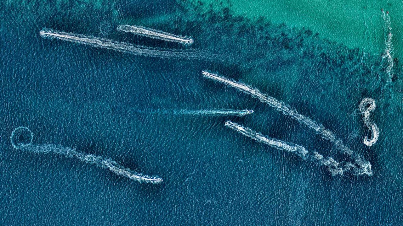 Aerial view of jet skis in the ocean, Australia