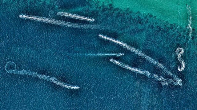 Aerial view of jet skis in the ocean, Australia